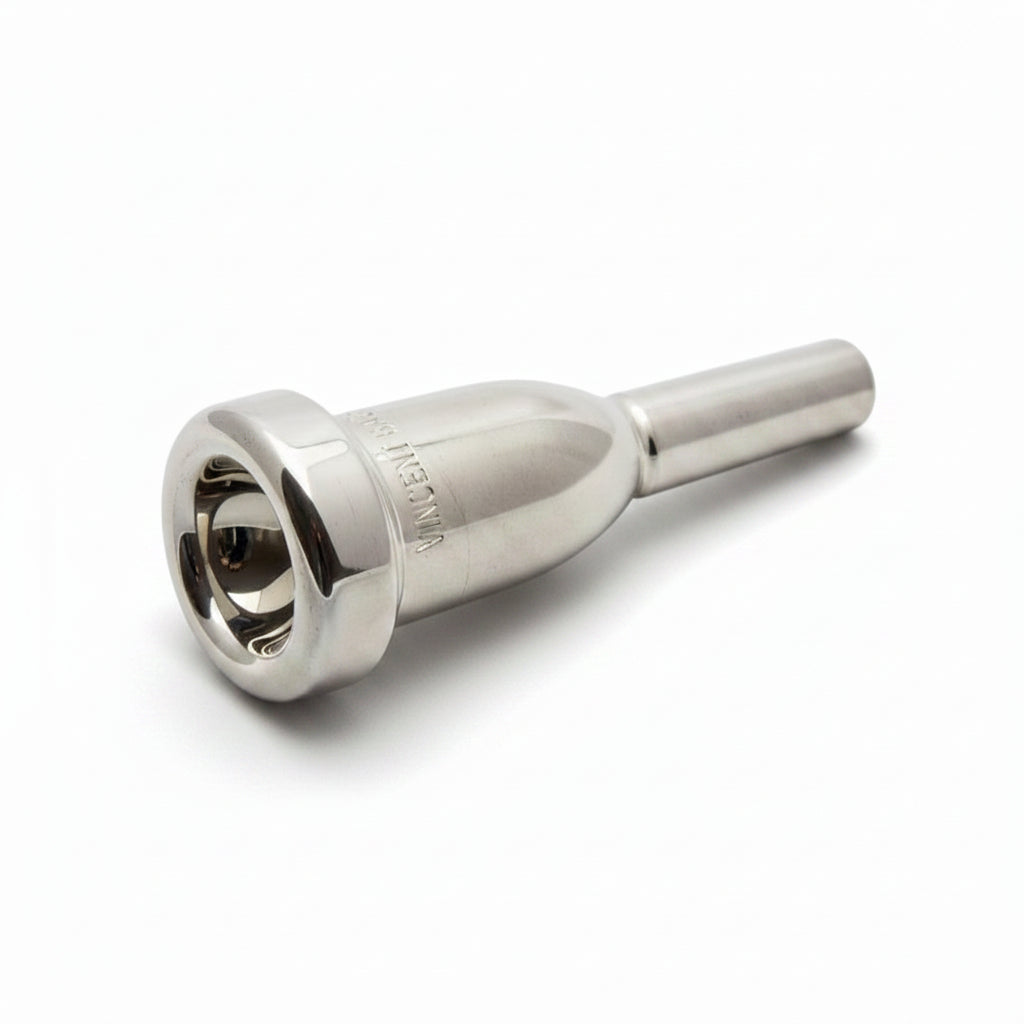 Silver trumpet mouthpiece on a white background