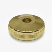 Gold metal cap on a white background